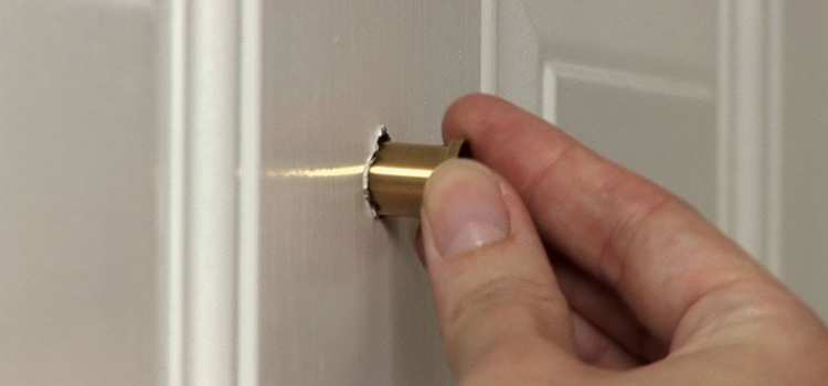 peephole door repair in Fowler